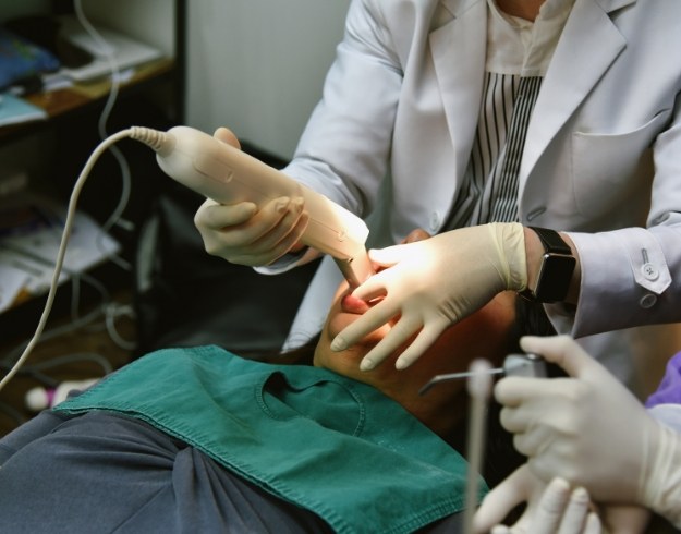 Dental patient having digital impressions taken