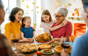 Family looking happy at the Thanksgiving dinner table